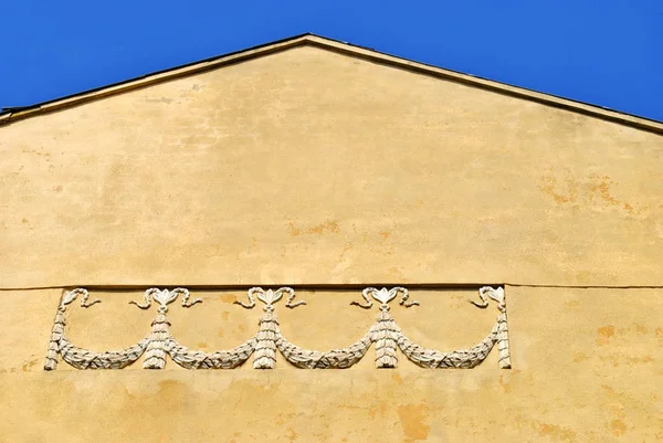 Facade of yellow old building — Stock Photo, Image