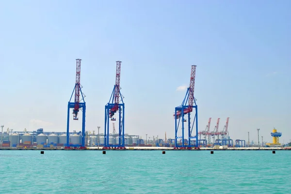 Cargo cranes in seaport — Stock Photo, Image