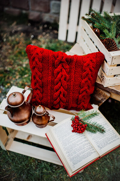 pillow, kettles and book