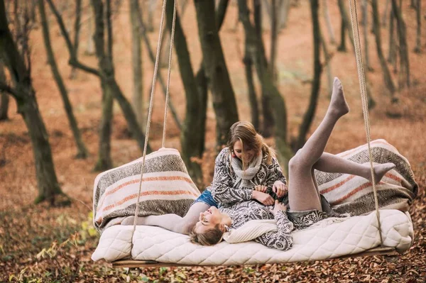 Twins in autumn forest — Stock Photo, Image