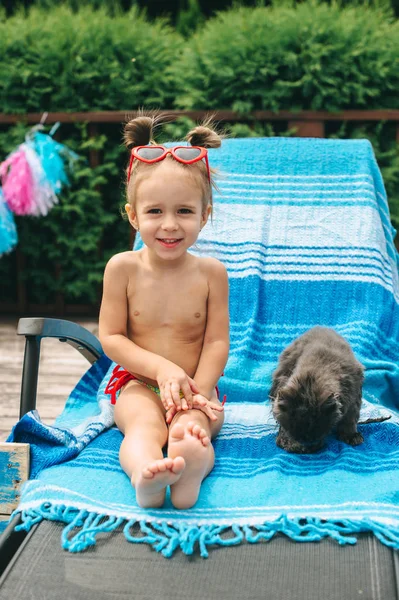 Little girl on chair — Stock Photo, Image