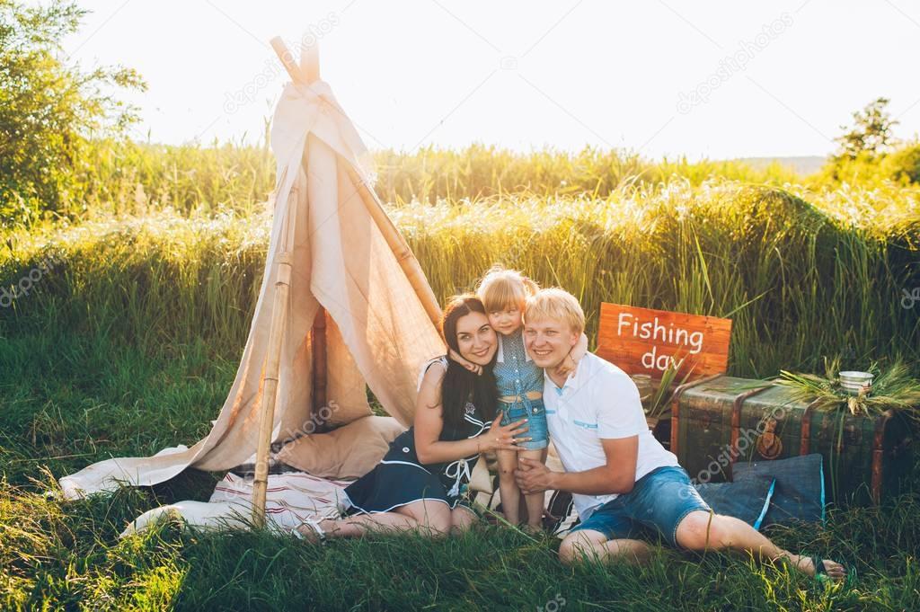 happy family in meadow