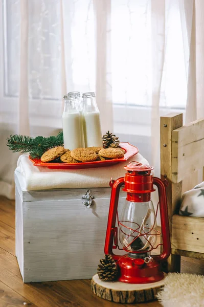 containers of milk and cookies