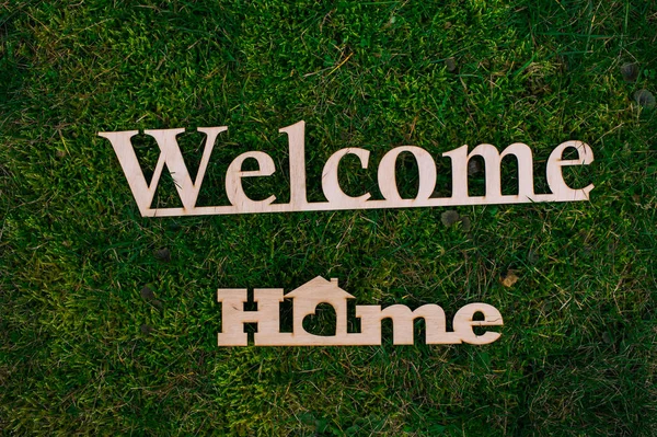 Wooden letters welcome home — Stock Photo, Image