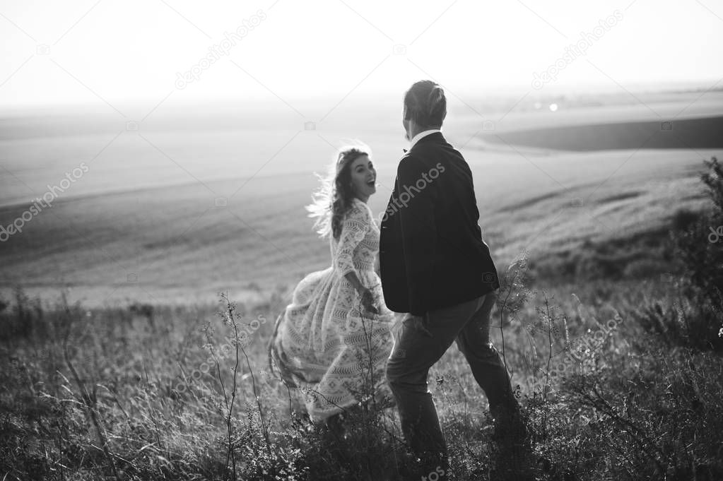 wedding couple in field 