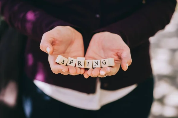 Word spring on wooden cubes — Stock Photo, Image