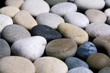 Deniz arka plan, siyah ve beyaz çakıl doku taşlar