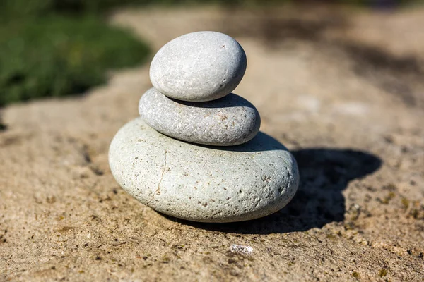 Spa stones on garden background — Stock Photo, Image