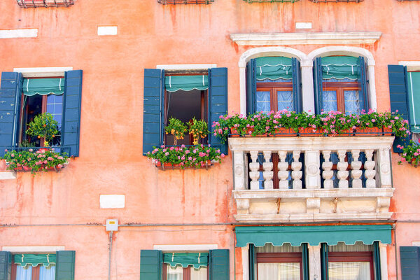 Facade of a traditional house in Venice, Italy.