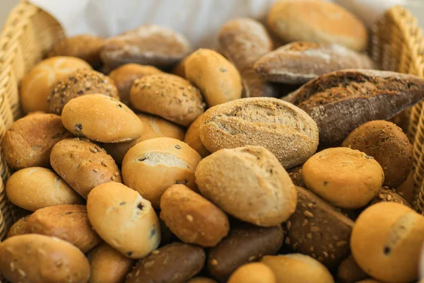 Fresh homemade bread rolls in little basket — Stock Photo, Image