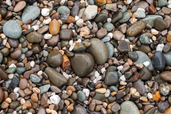 Havet pebble stenar bakgrund beach stenar — Stockfoto