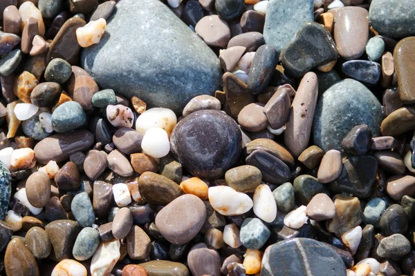 Havet pebble stenar bakgrund beach stenar — Stockfoto