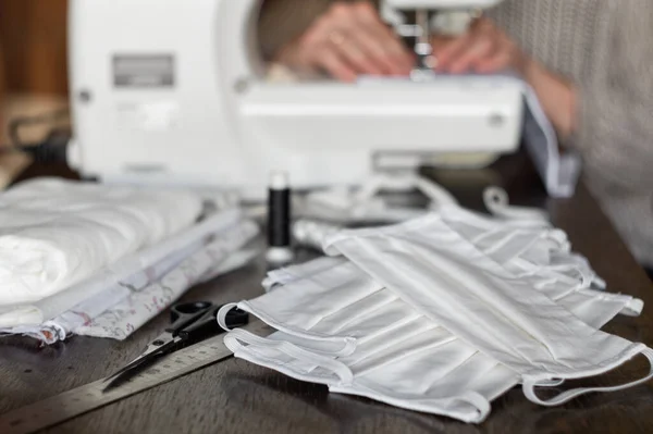 Female Volunteer Sews Protective Antivirus Masks Sewing Machine Home — Stock Photo, Image