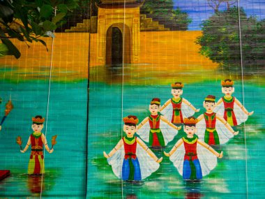 Hanoi, Vietnam - 19 Aralık 2019: Uzun Şeyler İmparatorluk Kalesi 'nde geleneksel Vietnam Su Kuklası' nı temsil eden resim.