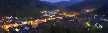 Night view of village in mountains, lights in village of Otsagabia, pyrenees of Navarra, Spain clipart