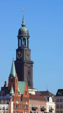HAMBURG, GERMANY - MARCH 8th, 2014: St. Michaels church, Hauptkirche Sankt Michaelis, colloquially called Michel, is one of Hamburgs five Lutheran main churches and the most famous church in the clipart