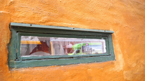 COPENHAGEN, DENMARK - JUL 06th, 2015: Detail of a wooden window at Nyboders Mindestuer Museum - yellow historical buldings in Old Town of Copenhagen and former naval barracks — Stock Photo, Image