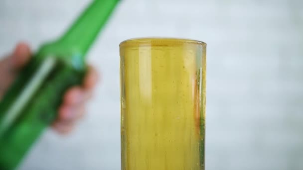 Full Glass with a Cold and Fresh Beer in Front of a Thirsty Person — Stock Video