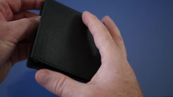 Bankrupt Person Showing an Empty Wallet with No Money Inside — Stockvideo