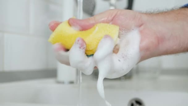 Men Hand with a Dishwashing Sponge Soaked with Detergent and a Lot of Foam — 비디오