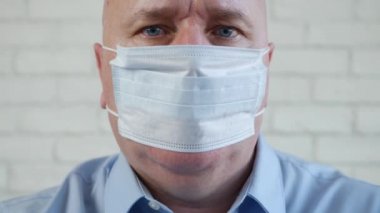 Man Wearing Face Mask Medical Protection Against Contamination with Coronavirus