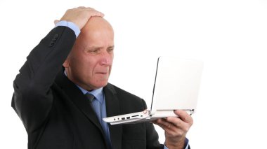 Businessman Image Gesturing Nervously Reading Disappointed Bad Financial News on Laptop