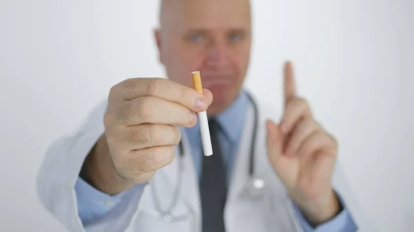Doctor Making a Disagree Gestures with a Cigarette in Hand in Anti Tobacco Campaign — Stockfoto