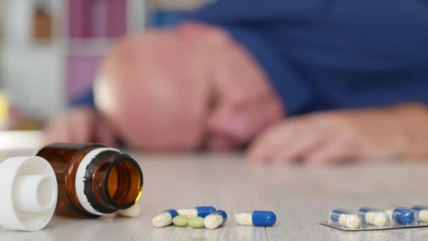 Elderly Person Having a Stroke Trying to Take Medical Pills for Emergency from the Floor — Stock Video