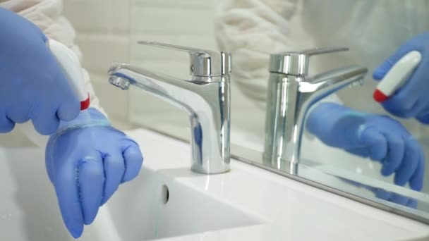 Man Wearing Protection Gloves Cleaning and Disinfecting His Hands With Antibacterial Solution Against Viruses — Stock Video