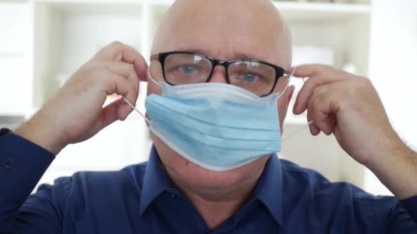 Slow Motion with Doctor Nearing Protective Face Mask, Medical Person with Protection Equipment in a Quarantined Hospital against Virus Epidemic — Wideo stockowe