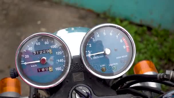 Zoom out of motorcycle speedometer — Stock Video