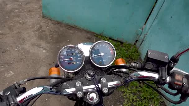 Zoom in of motorcycle speedometer — Stock Video