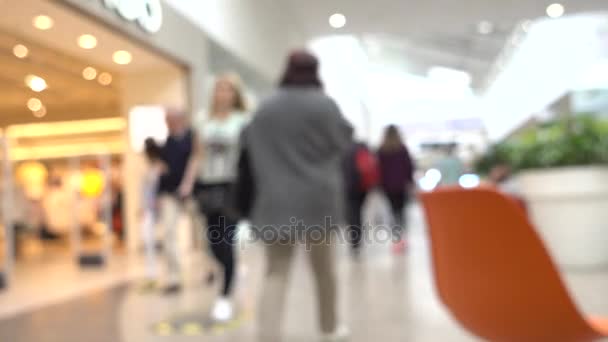 Abstract blurred background people shopping for diverse products in supermarket. — Stock Video