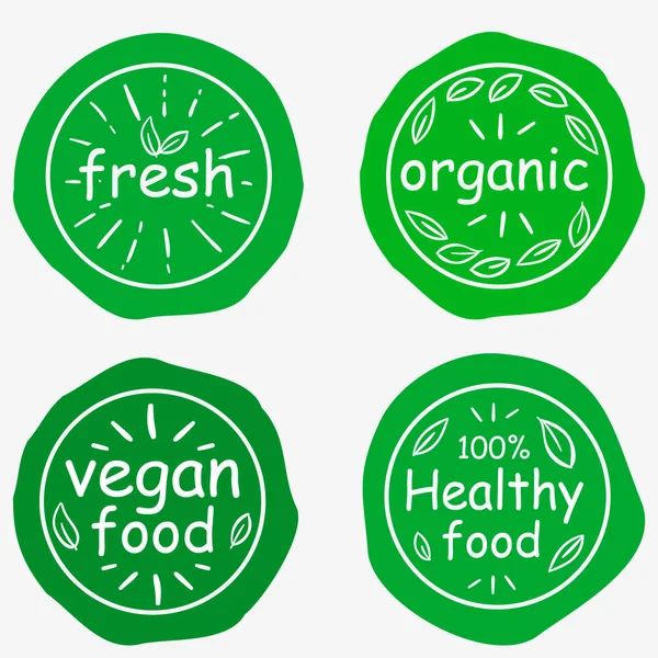 Set of four vegetarian labels with lettering. Healthy food stickers. — Stock Vector