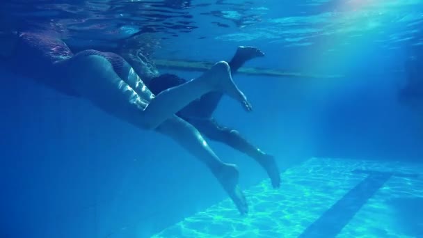 Woman Man Swimsuits Simultaneously Raise Feet Pool Swim Water Sexually — Stock Video