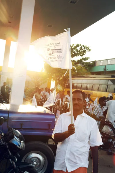 NANNILAM, INDIA - 09 MAY 2016: man holding a flag — Stock Photo, Image