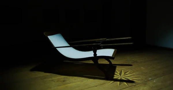 One wooden old retro chair in the dark room, Dark room in the abandoned house Stock Picture