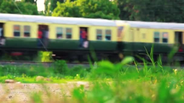 Passenger train passing from India. — Stock Video