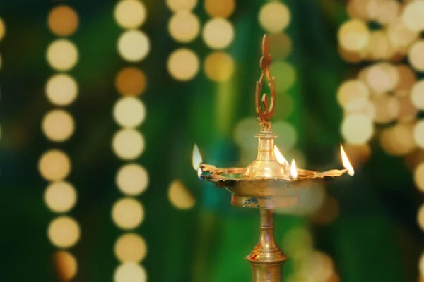 Oil lamps on Indian wedding ceremony with lights. — Stock Photo, Image