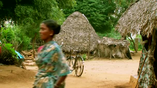 INDIA - MAY 15, 2016: Rural Indian village thatched house — Stock Video