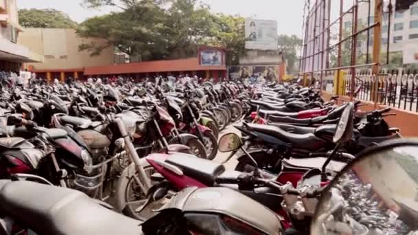 CHENNAI, INDIA - JUNE 13th, 2016: Bike parking in the movie theater. — Stock Video