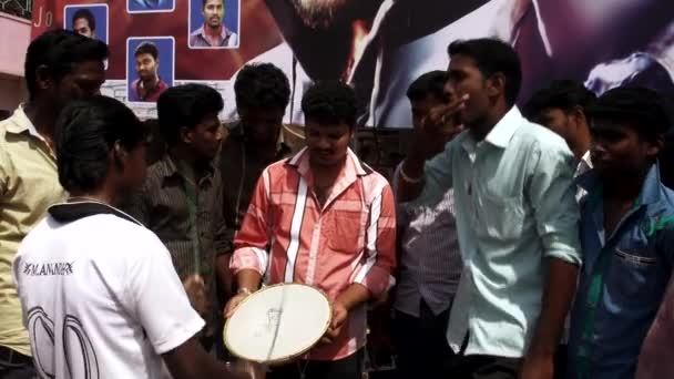 CHENNAI, INDIA - JUNE 13th, 2016:Young street performers play music and dances, First day movie release on theater at India. — Stock Video