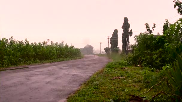 INDIA -  MARCH 1, 2017: Young man ride on motorcycle at nature background — Stock Video