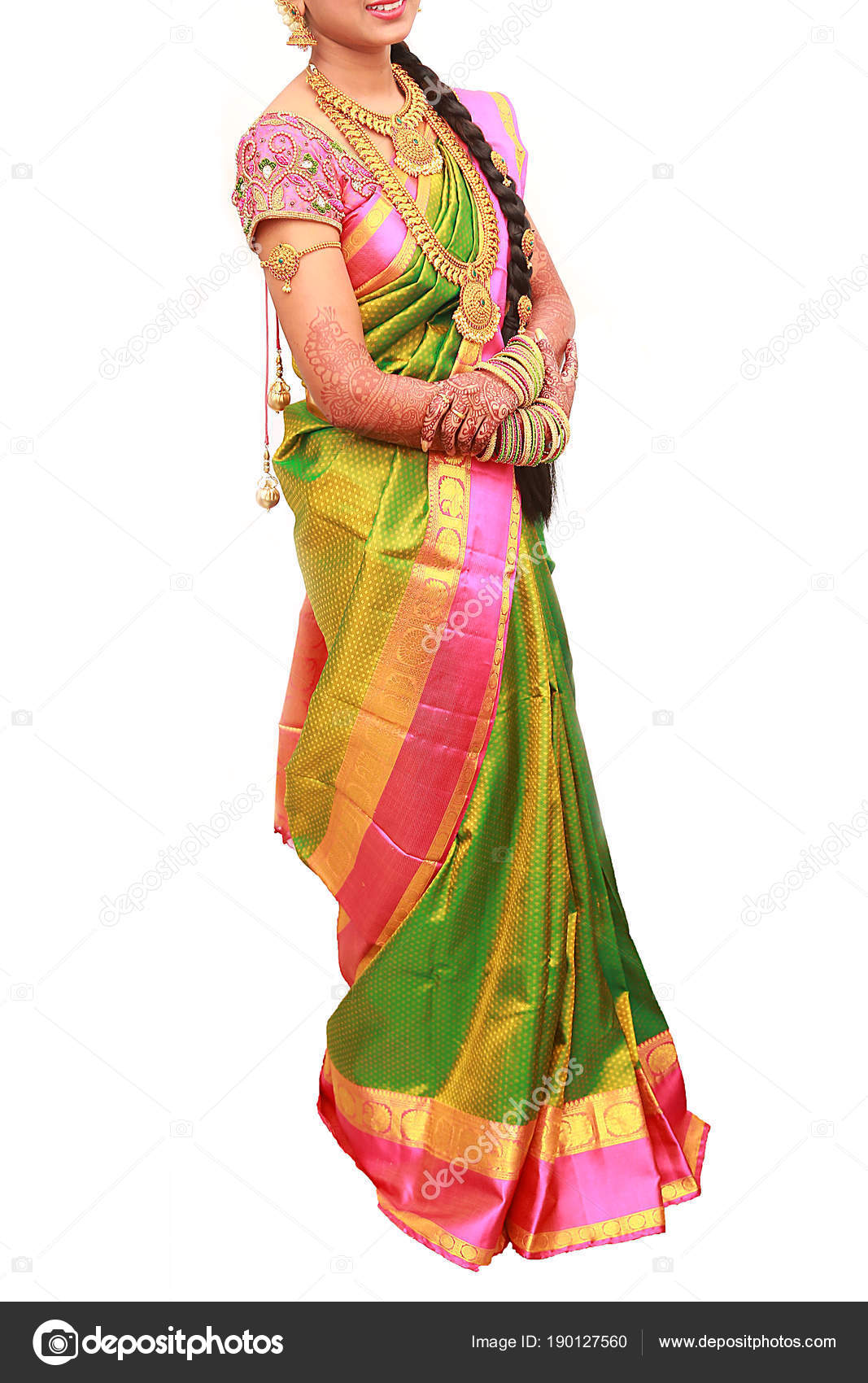 Traditional Young Bride In Wedding Dress And Posing On Studio