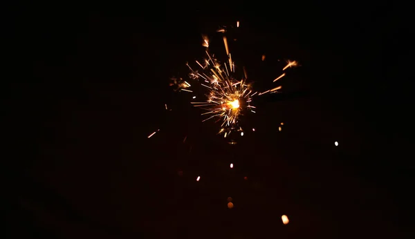 Beautiful Diwali Glowing Firecracker, fire of cracker explosion on black background — ストック写真