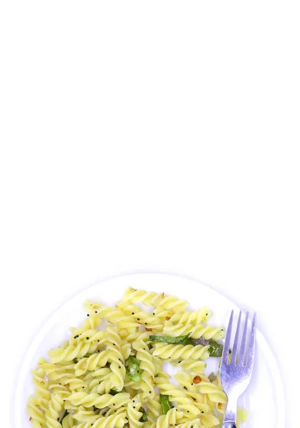 Plate of pasta with copy space on white background, top view — Stock Photo, Image