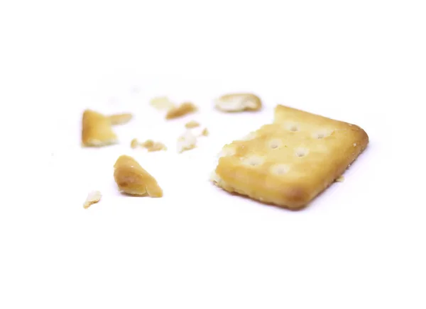 Closeup θρυμματισμένα μπισκότα απομονωμένα σε λευκό φόντο — Φωτογραφία Αρχείου