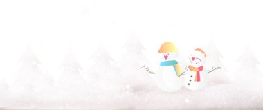Mutlu Noeller ve fotokopi çekimli yeni yıl tebrik kartı. Kışın Noel manzarasında duran kardan adamlar. Kış arkaplanı.