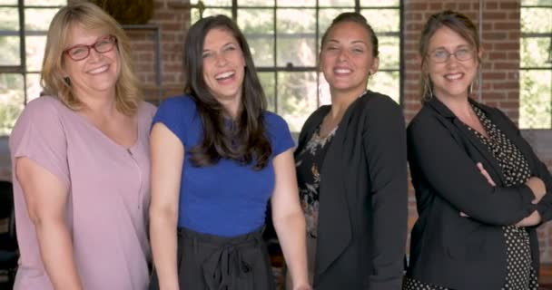 Diverse multi-ethnic all female entrepreneur team smiling for the camera — Stock Video