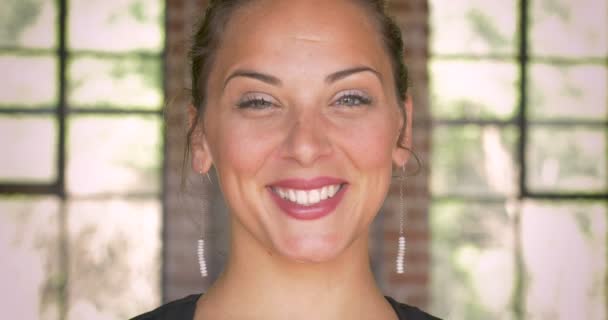 Close up portrait of a smiling happy multi ethnic millennial woman — Stock Video